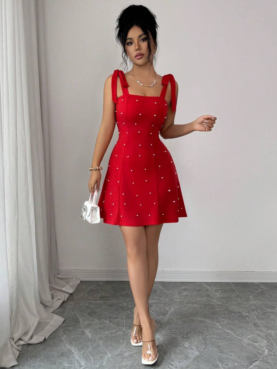 Ženska Elegantna Mini Haljina Jedinstvenog Dizajna sa Perlama i Mašnom