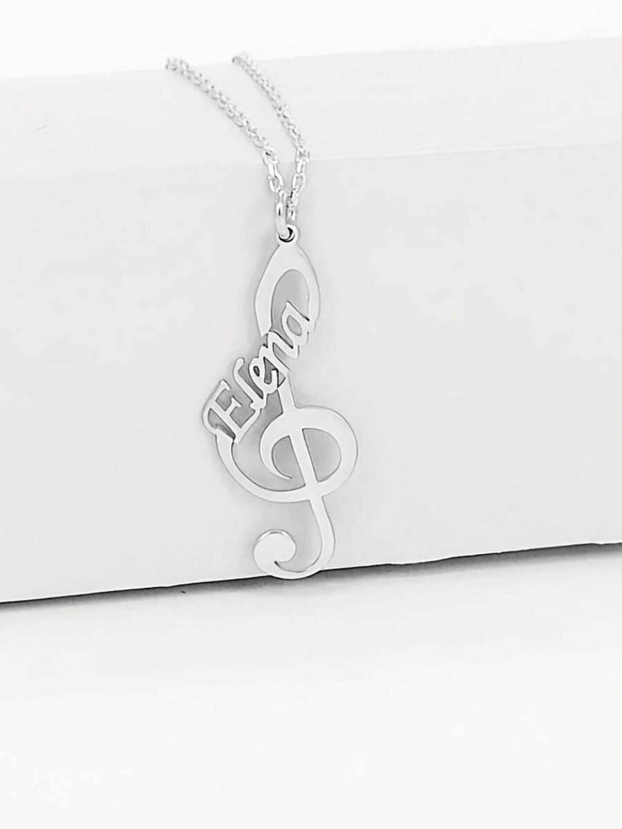 Personalizovana ogrlica sa muzičkom notom i imenom