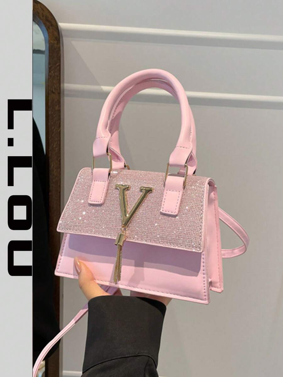 Mini ležerna kvadratna torba sa dvostrukim gornjim ručkama, preklopnim zatvaranjem, metalnim V detaljem
