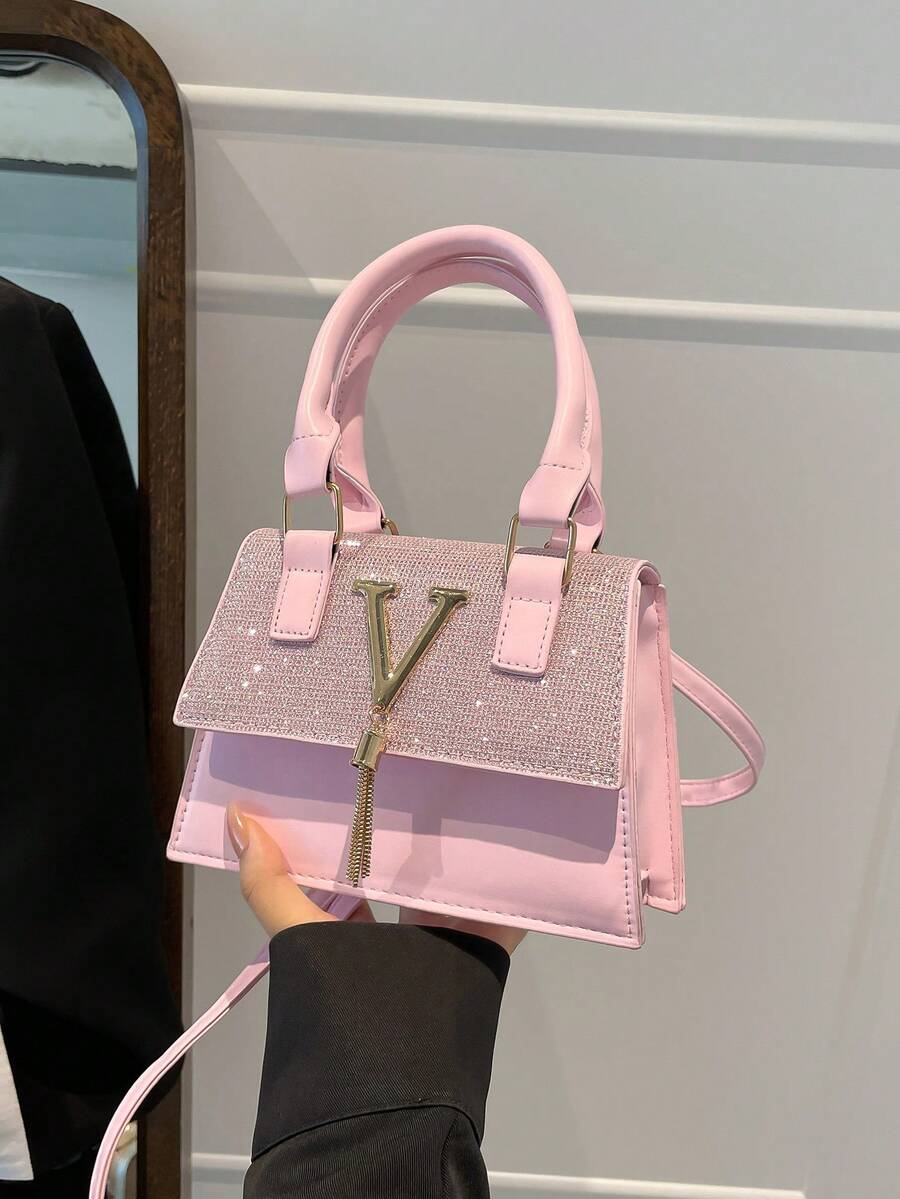 Mini ležerna kvadratna torba sa dvostrukim gornjim ručkama, preklopnim zatvaranjem, metalnim V detaljem