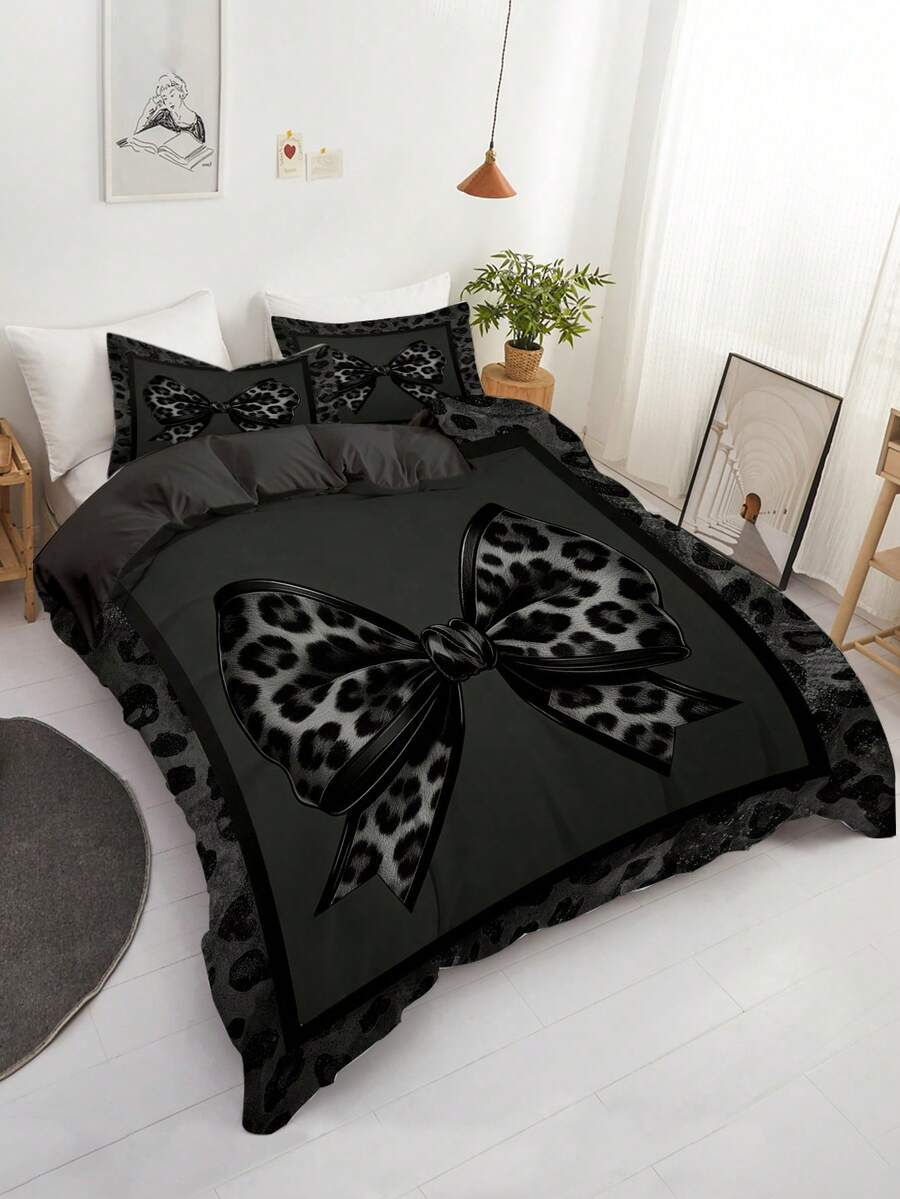 Set posteljine sa leopard printom i mašnom, 3 komada (1 navlaka za jorgan + 2 jastučnice, jorgan nije uključen)