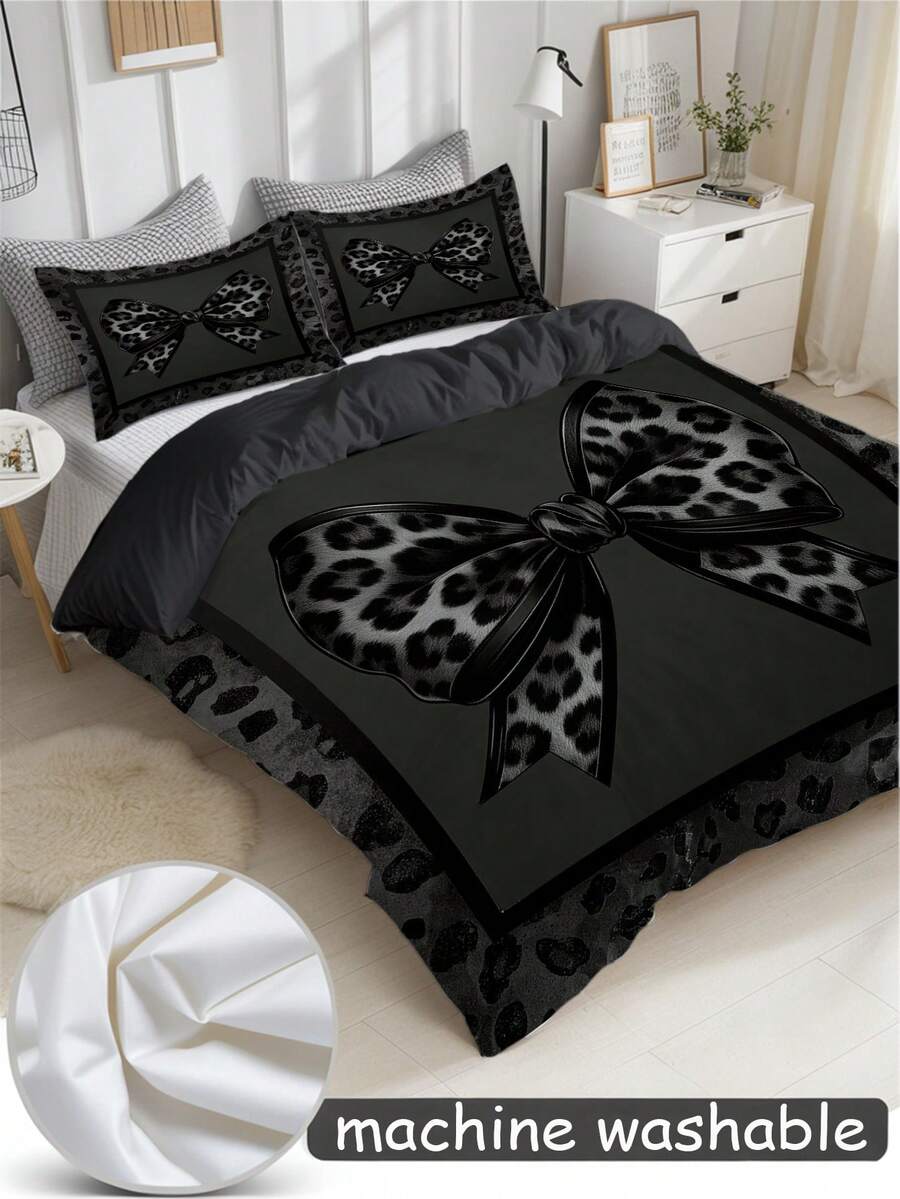 Set posteljine sa leopard printom i mašnom, 3 komada (1 navlaka za jorgan + 2 jastučnice, jorgan nije uključen)