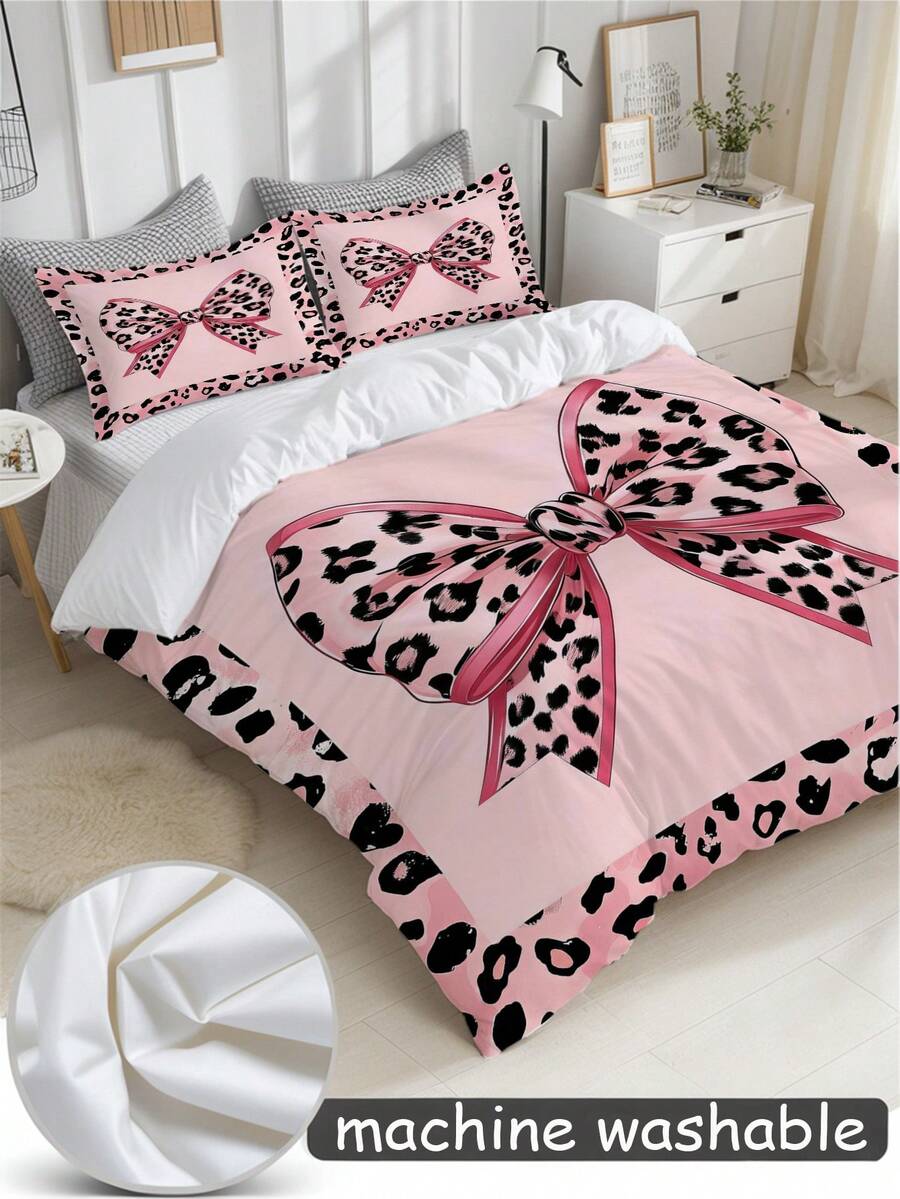 Set posteljine sa leopard printom i mašnom, 3 komada (1 navlaka za jorgan + 2 jastučnice, jorgan nije uključen)
