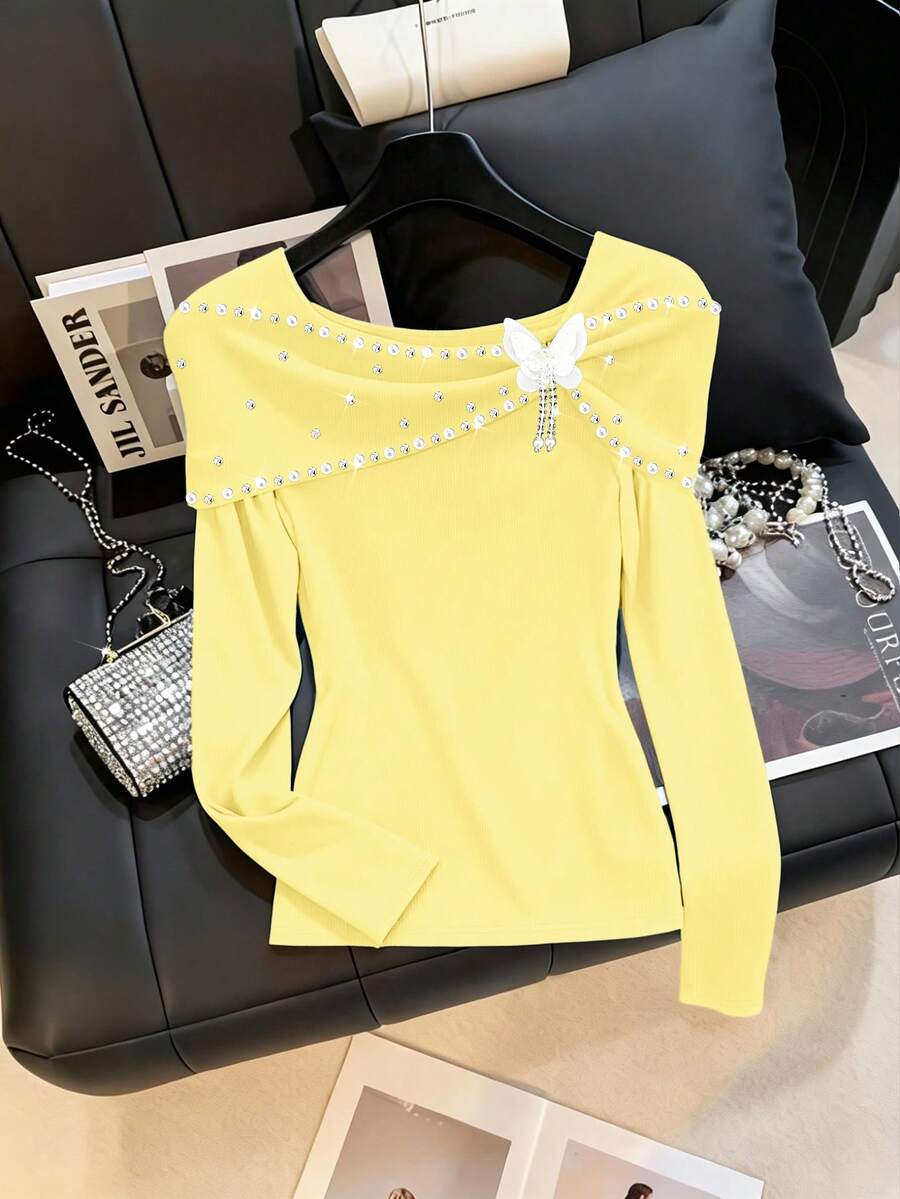 Clasi Majica plus size od crnog pletenog materijala, regular kroja, dugih rukava, sa perla detaljima