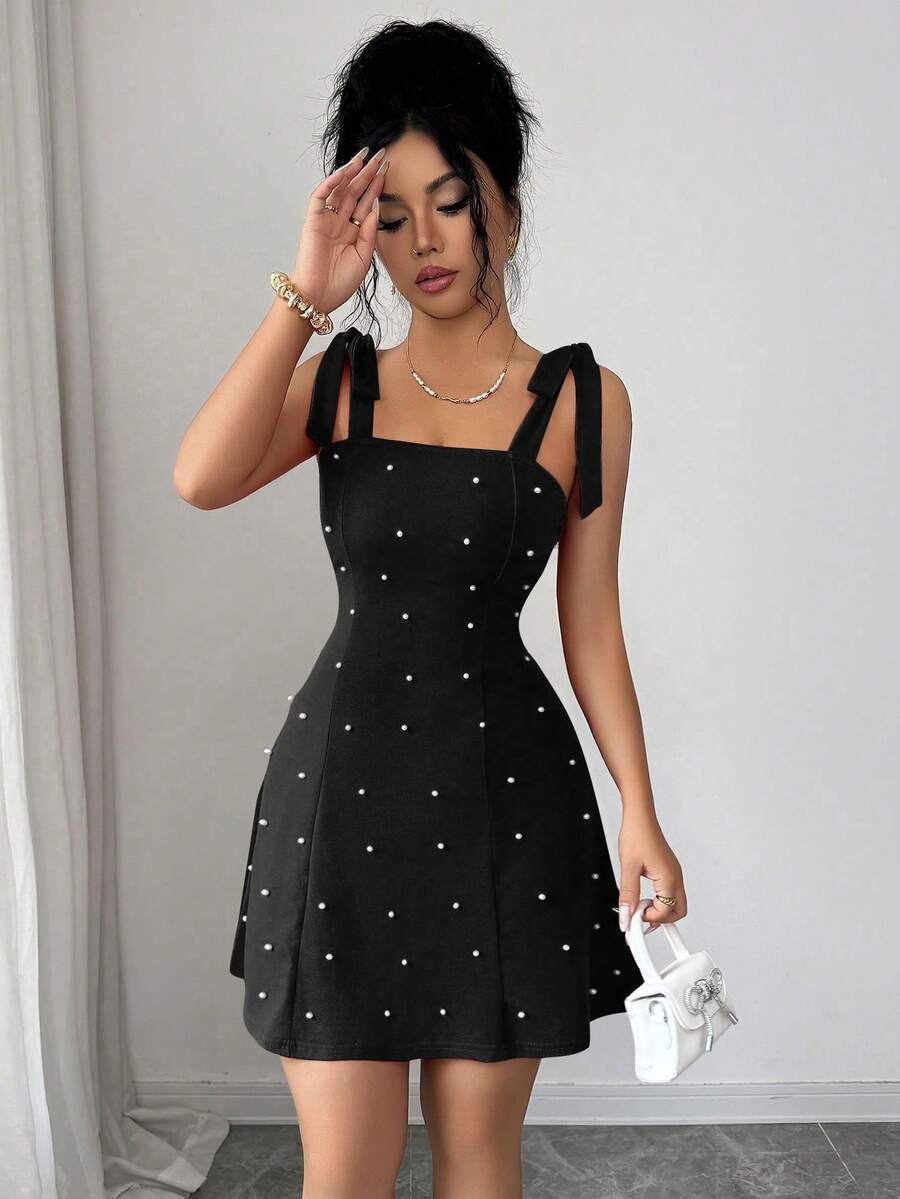Ženska Elegantna Mini Haljina Jedinstvenog Dizajna sa Perlama i Mašnom