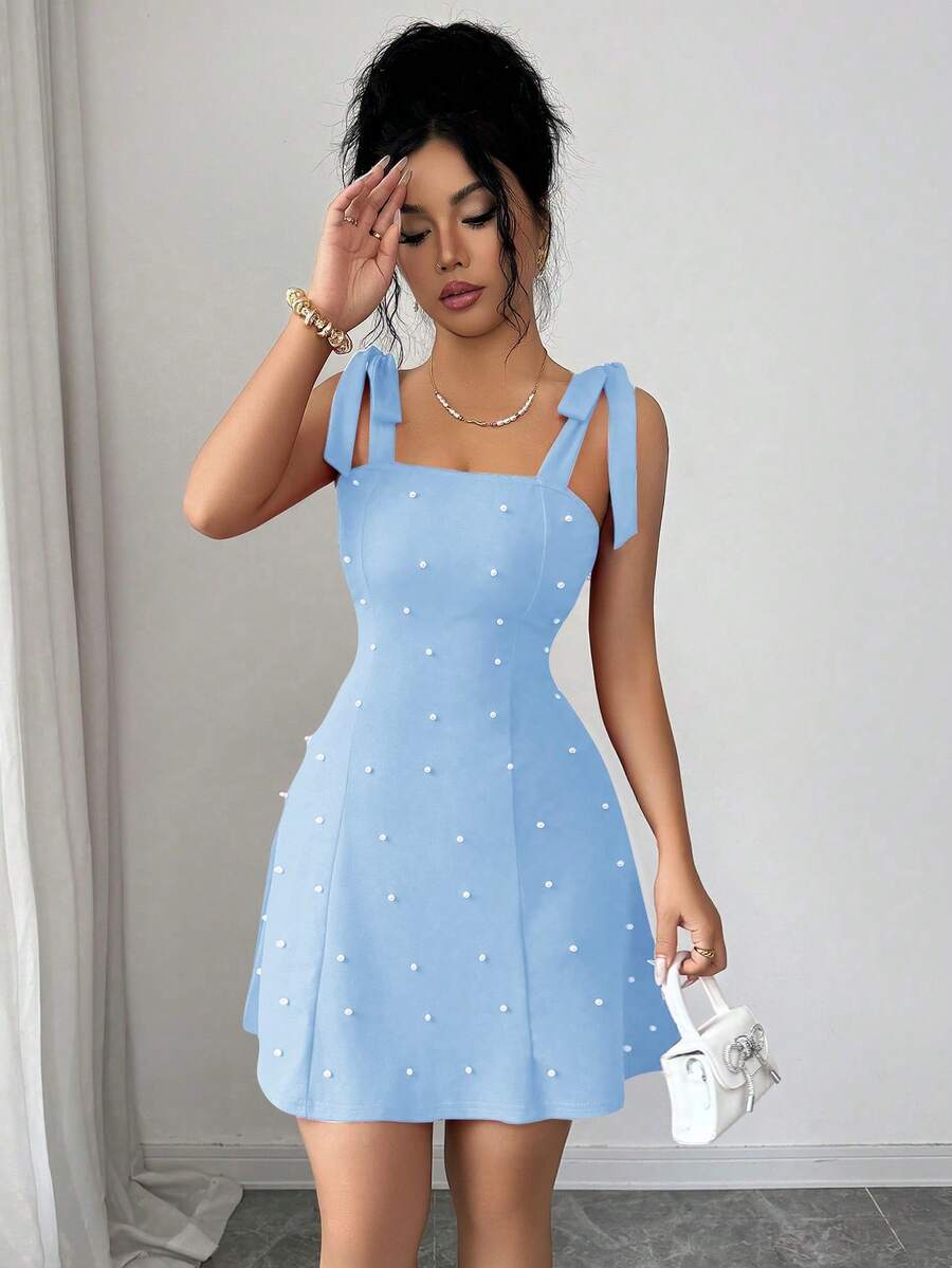 Ženska Elegantna Mini Haljina Jedinstvenog Dizajna sa Perlama i Mašnom