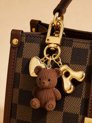 Privezak za ključeve sa medvedićem i zlatnim slovima A-Z