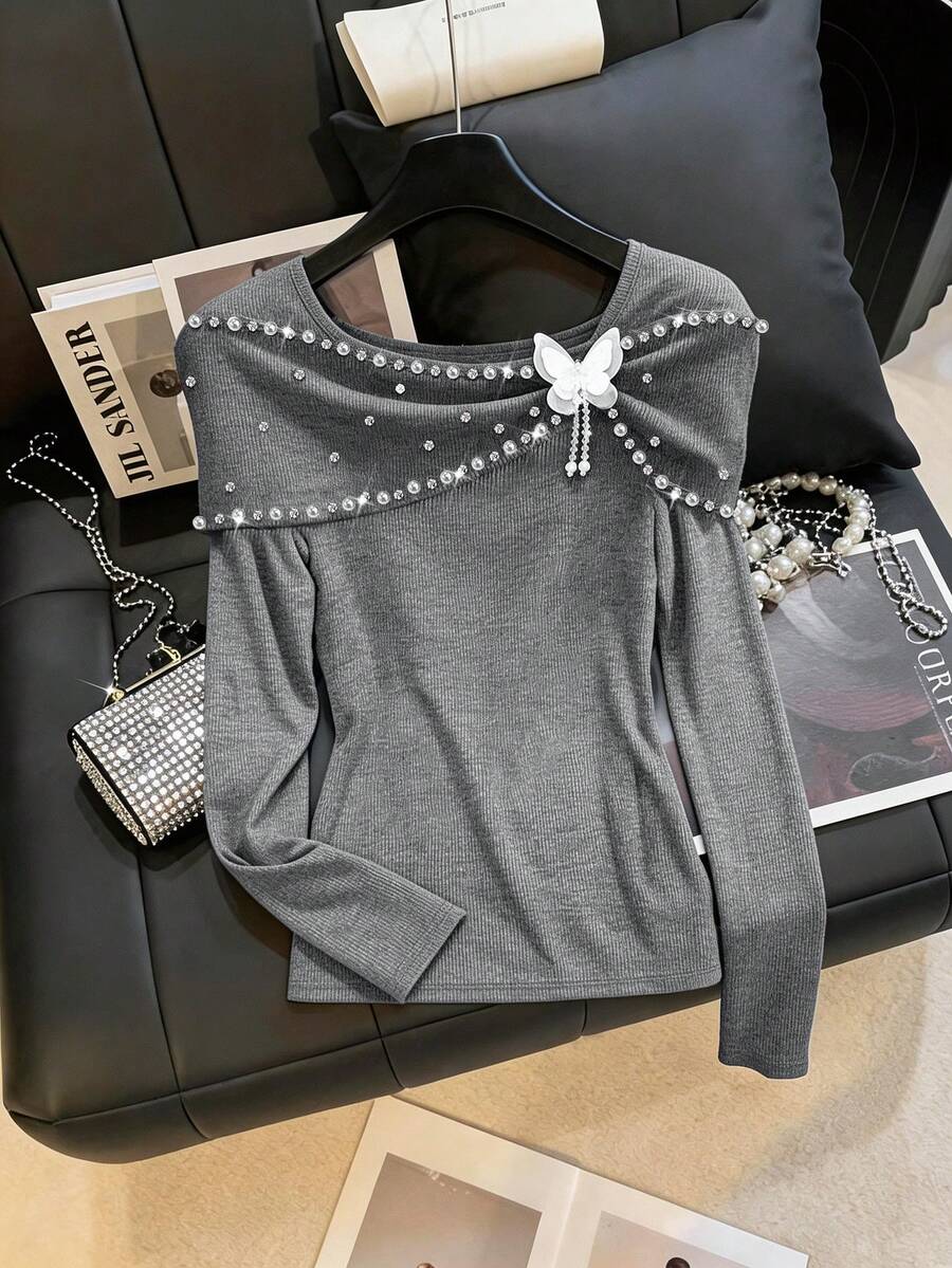 Clasi Majica plus size od crnog pletenog materijala, regular kroja, dugih rukava, sa perla detaljima