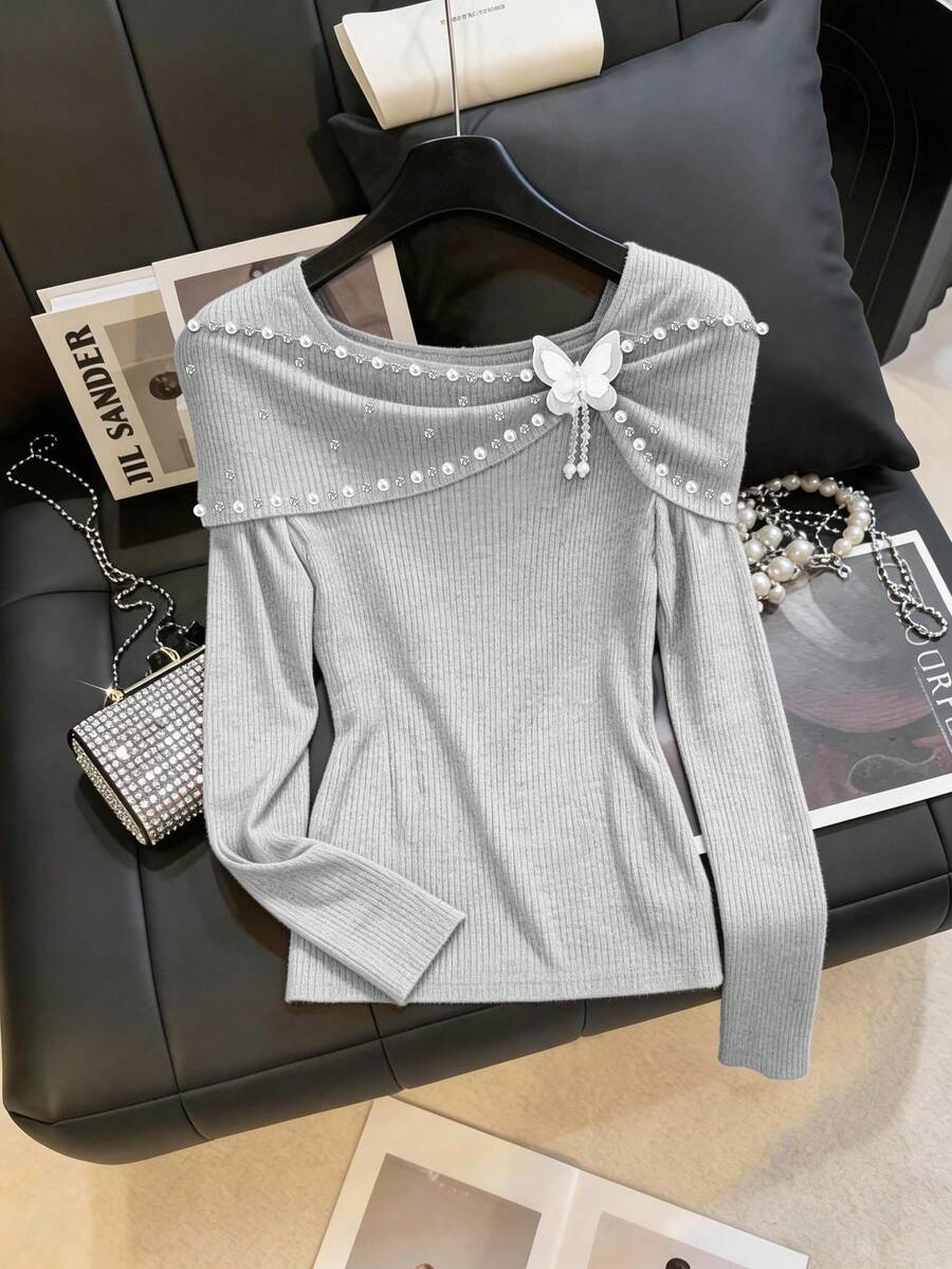 Clasi Majica plus size od crnog pletenog materijala, regular kroja, dugih rukava, sa perla detaljima