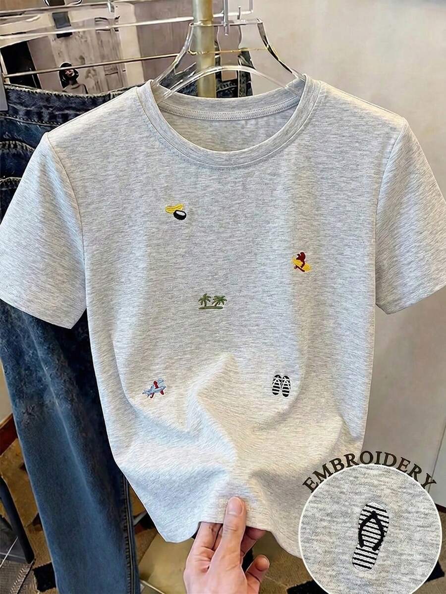 Bela i Srebrna Elegantna Letnja Bela Majica sa Kratkim Rukavima