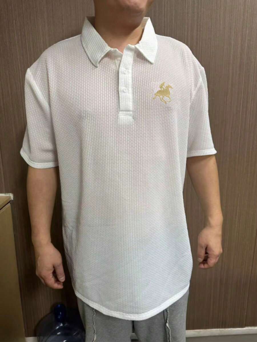 Elegantna muška polo majica sa vezenim uzorkom
