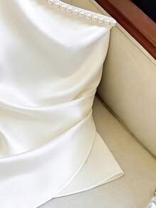 Franclia Ivory Satin Off White Asymmetric Shoulder Pearl Decor Twist Waist Asymmetrical Hem Sleeveless Top