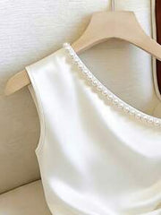 Franclia Ivory Satin Off White Asymmetric Shoulder Pearl Decor Twist Waist Asymmetrical Hem Sleeveless Top