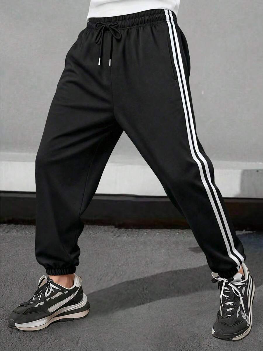 Letnje lagane prugaste joger pantalone, muške široke svestrane
