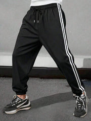 Letnje lagane prugaste joger pantalone, muške široke svestrane