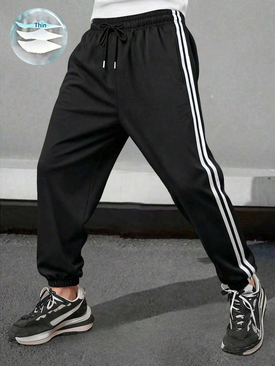 Letnje lagane prugaste joger pantalone, muške široke svestrane