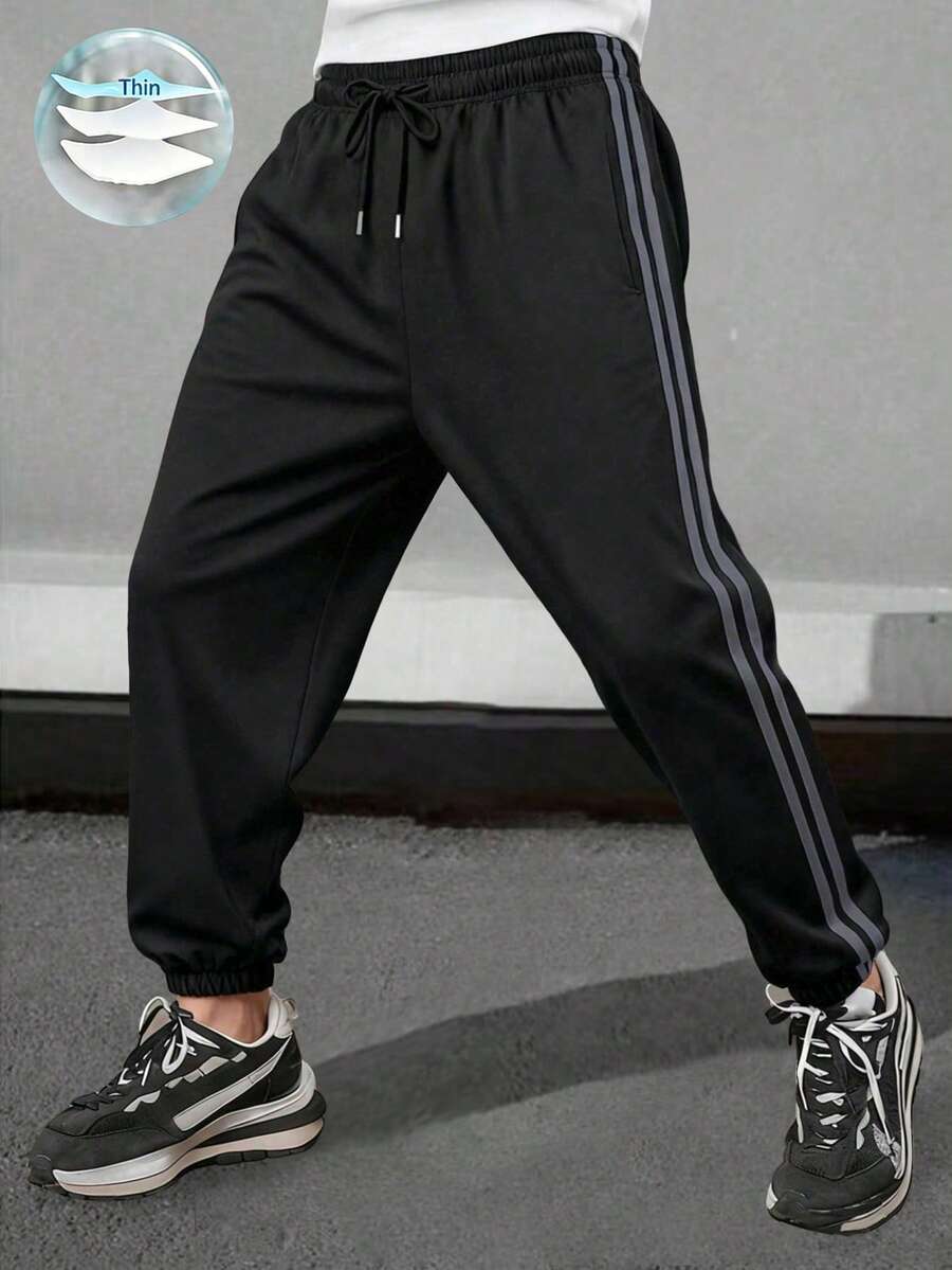 Letnje lagane prugaste joger pantalone, muške široke svestrane