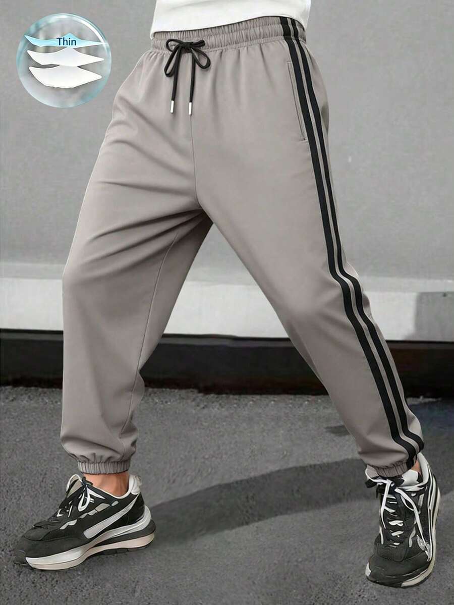 Letnje lagane prugaste joger pantalone, muške široke svestrane
