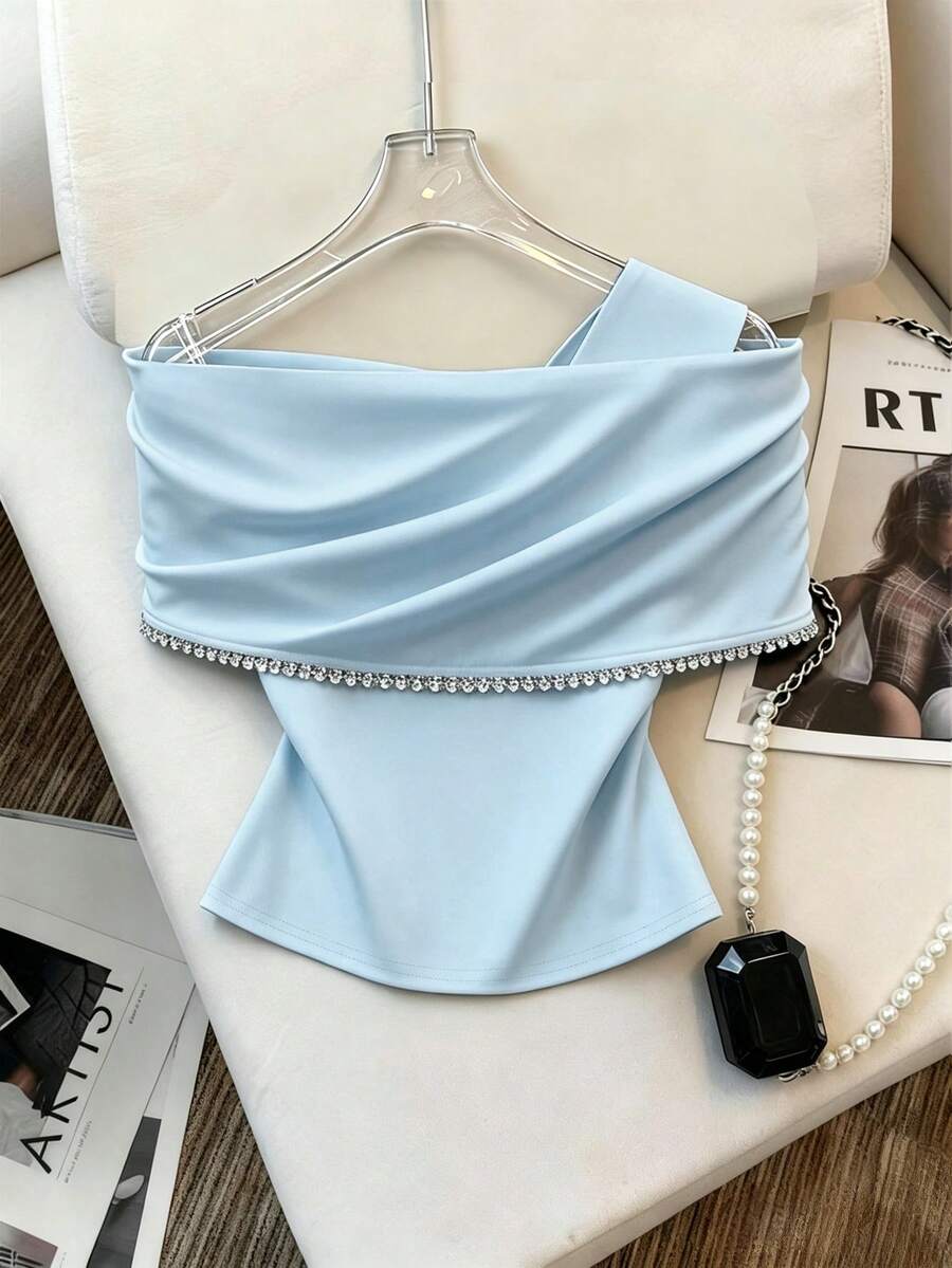 Ženski elegantni top sa kristalima i velikom mašnom