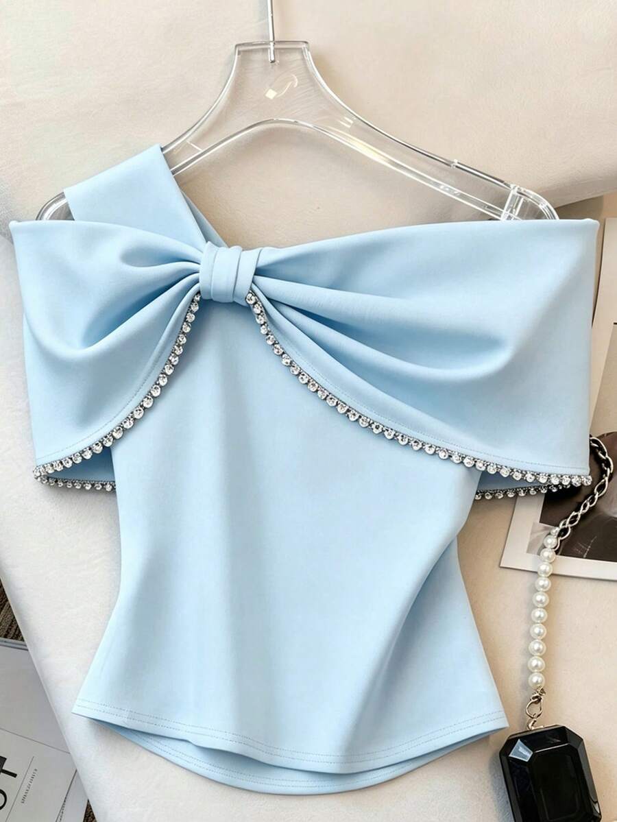 Ženski elegantni top sa kristalima i velikom mašnom