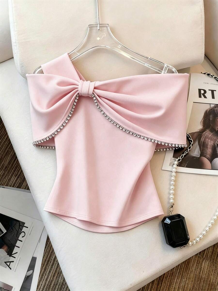 Ženski elegantni top sa kristalima i velikom mašnom