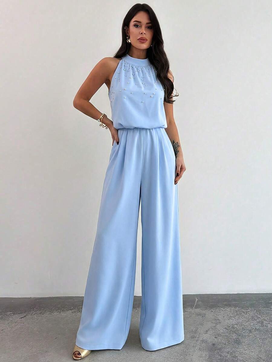 Ženski elegantni kombinezon bez rukava sa perlama