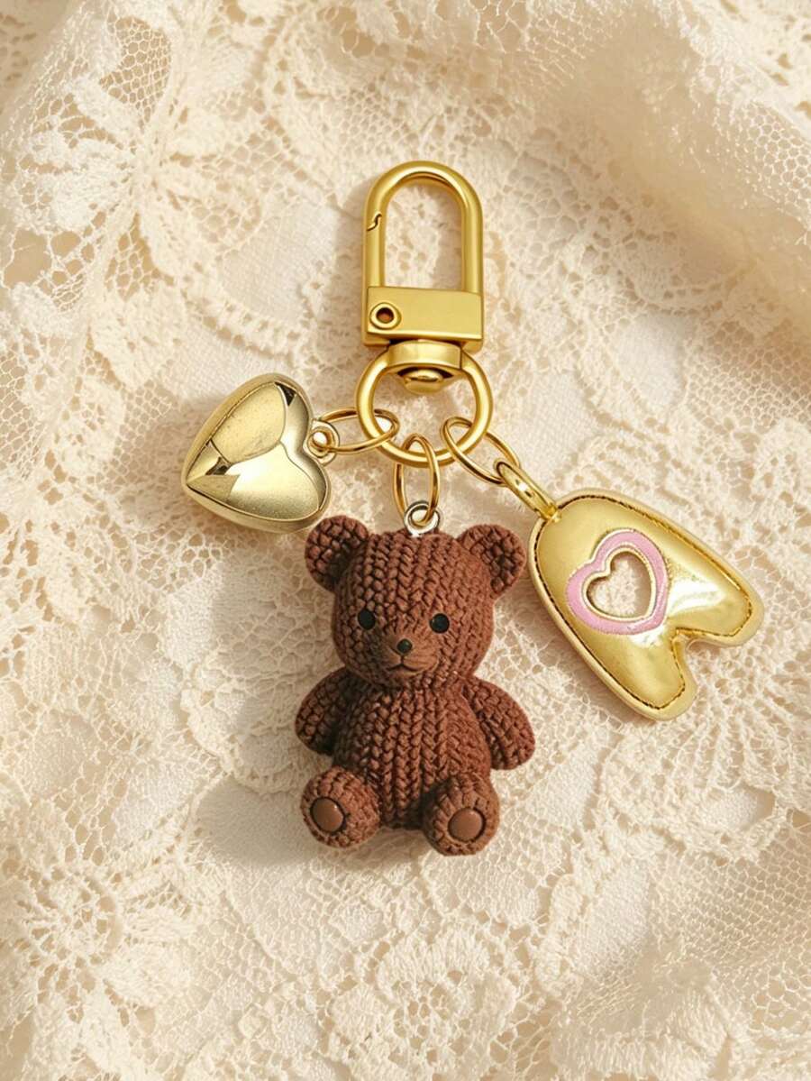 Privezak za ključeve sa medvedićem i zlatnim slovima A-Z