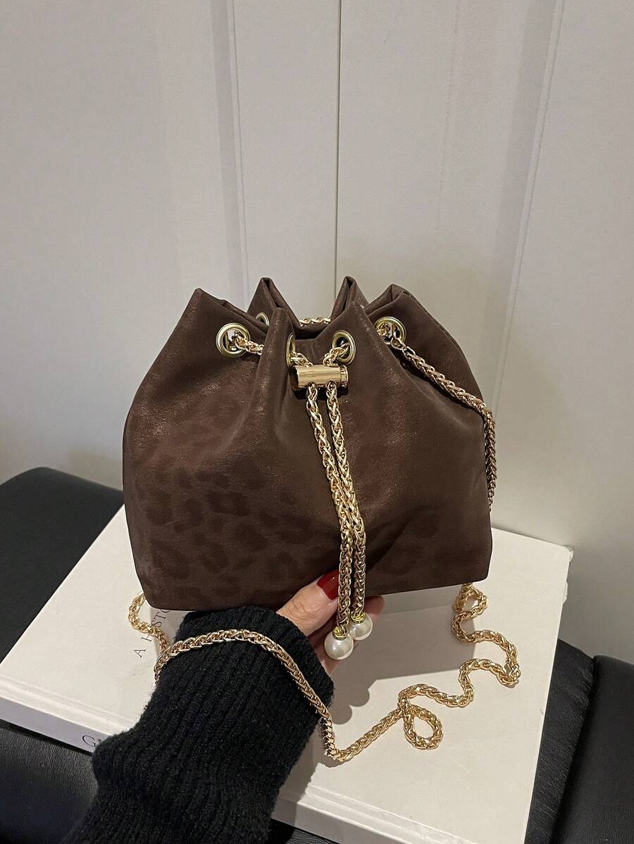 Moderna mini torba  jednobojna sa lanac kaišem