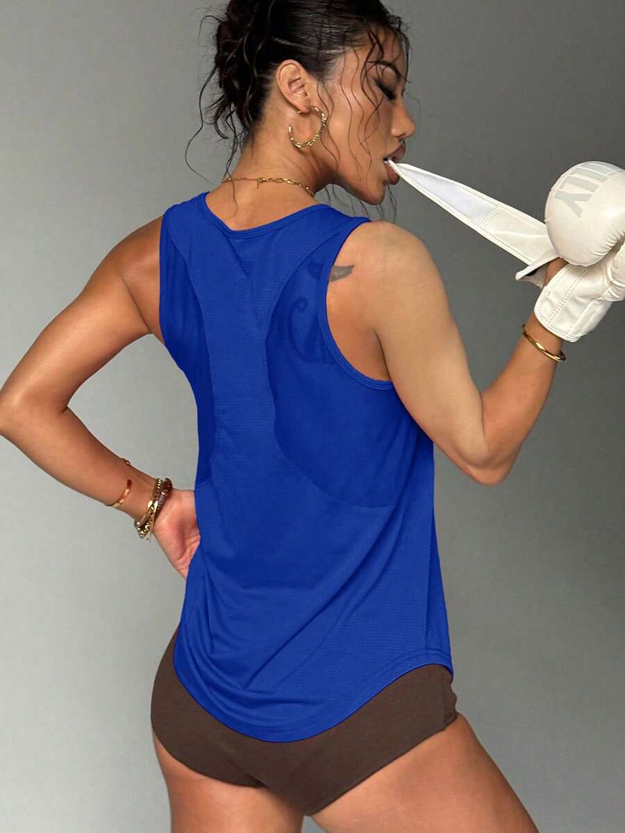 Jednobojna sportska majica na bretele sa otvorenim leđima, fitnes top