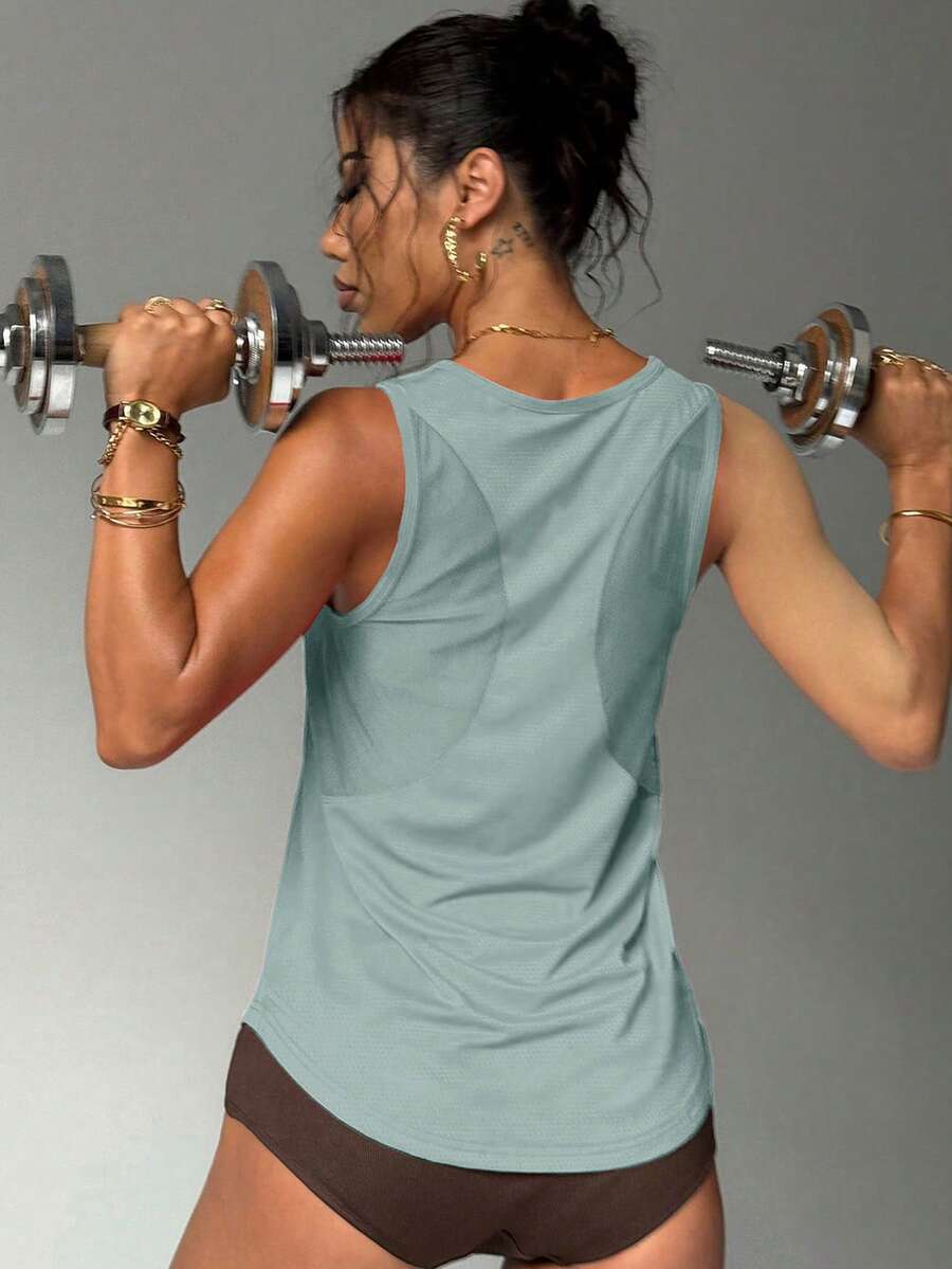 Jednobojna sportska majica na bretele sa otvorenim leđima, fitnes top
