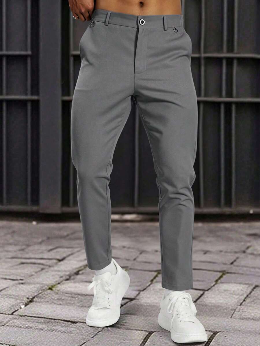 Muške formalne pantalone jednobojne sa kosim džepovima, bez kaiša