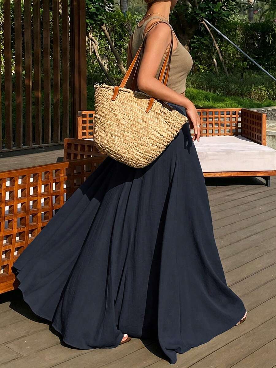 Ženska duga suknja u kišobran kroju, široka, jednobojna, elegantna