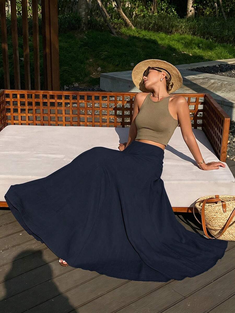 Ženska duga suknja u kišobran kroju, široka, jednobojna, elegantna