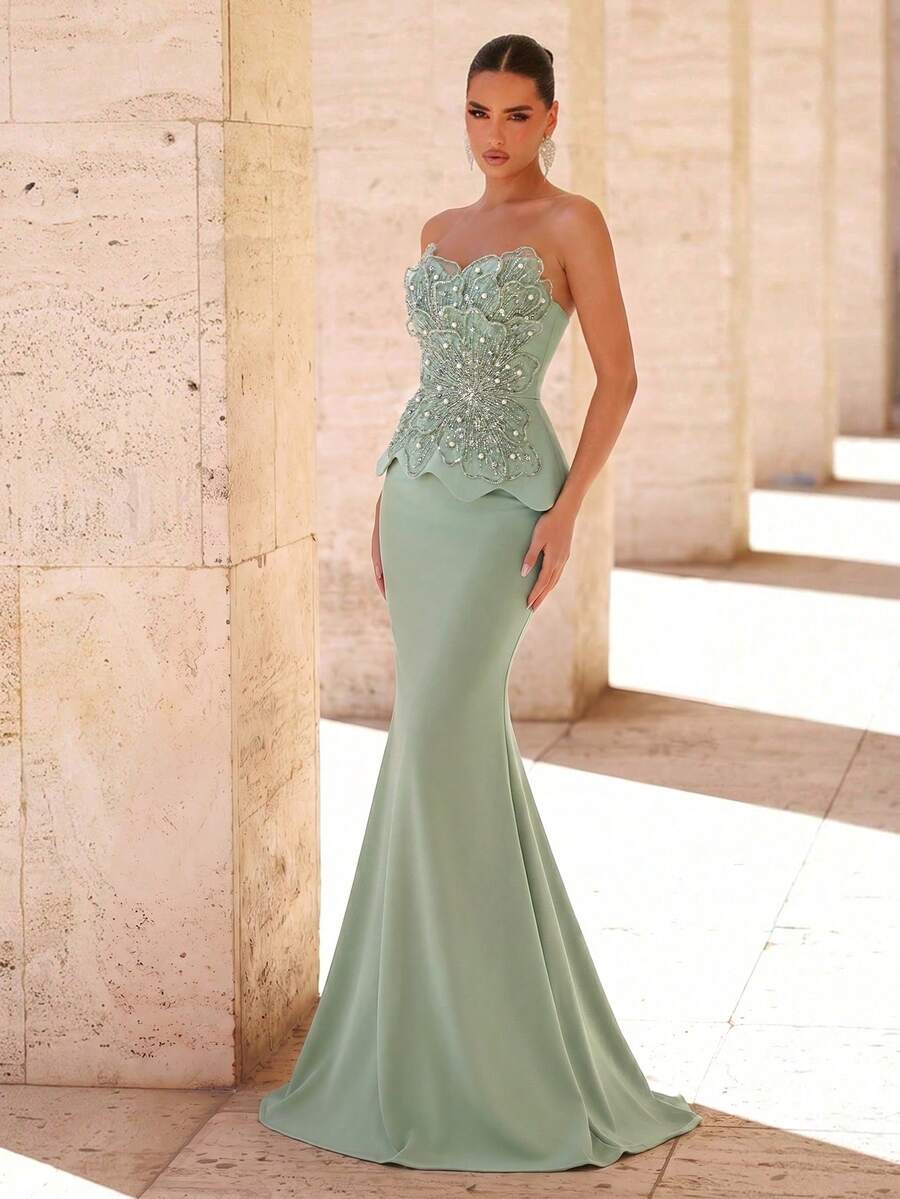 Elegantna luksuzna haljina od rastegljivog materijala sa perlicama