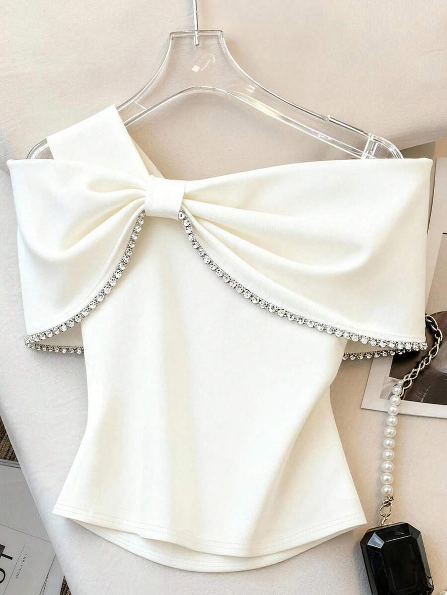 Ženski elegantni top sa kristalima i velikom mašnom