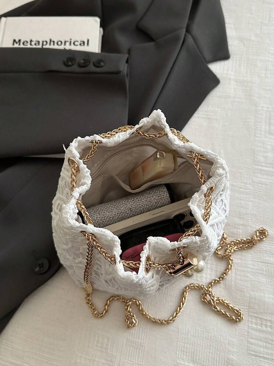 Moderna mini torba  jednobojna sa lanac kaišem