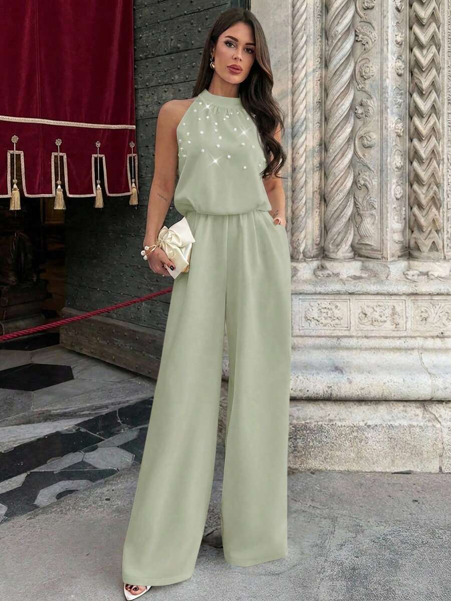 Ženski elegantni kombinezon bez rukava sa perlama