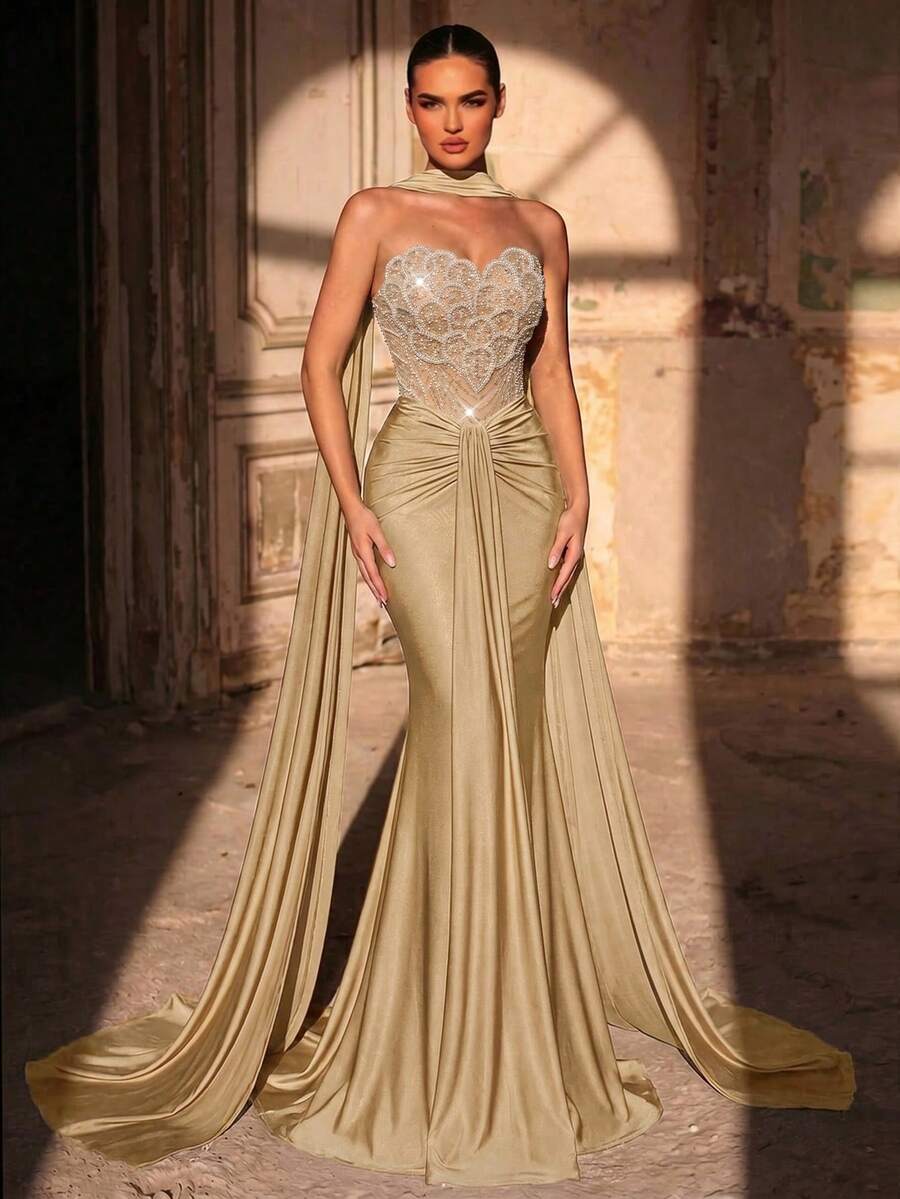 Elegantna luksuzna haljina od elastičnog materijala sa perlicama