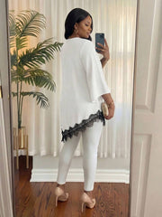 Elegantna bluza za žene plus size sa cvetnim vezom