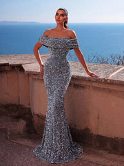 Elegantna haljina sa otvorenim ramenima sa šljokicama