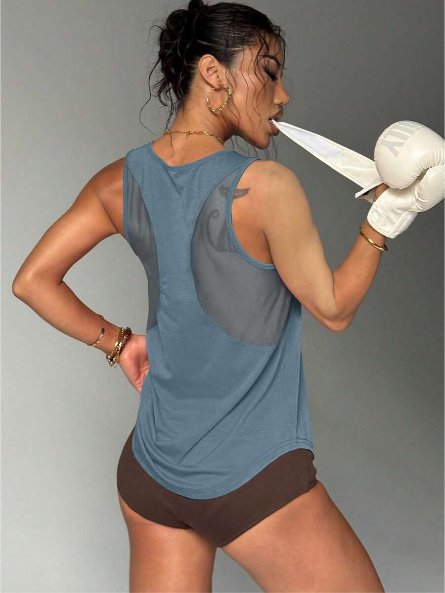 Jednobojna sportska majica na bretele sa otvorenim leđima, fitnes top