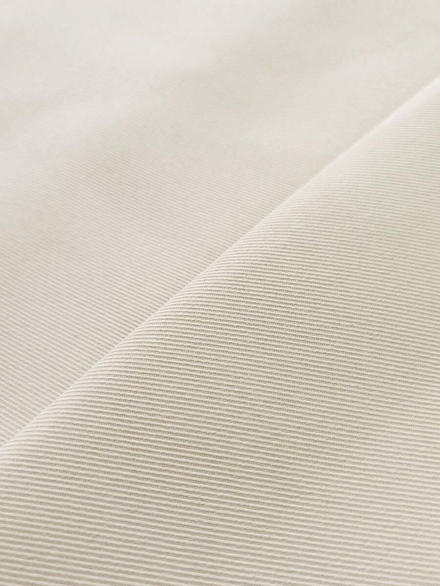 Muške ležerne pantalone ravnih nogavica jednobojne sa perticom u struku i džepovima