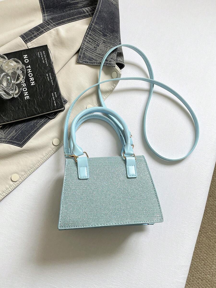 Mini ležerna kvadratna torba sa dvostrukim gornjim ručkama, preklopnim zatvaranjem, metalnim V detaljem