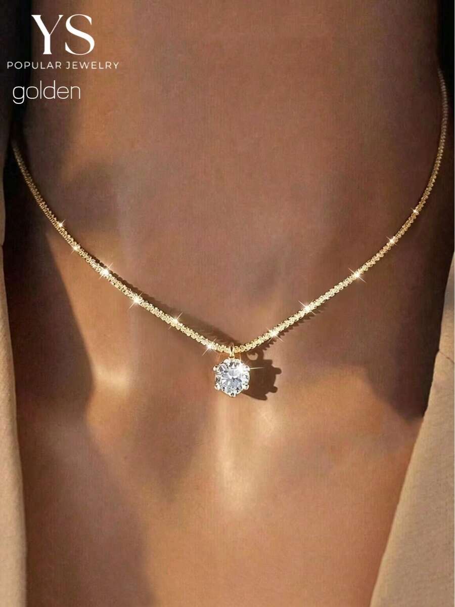 Zlatni privesak sa jednim dijamantom