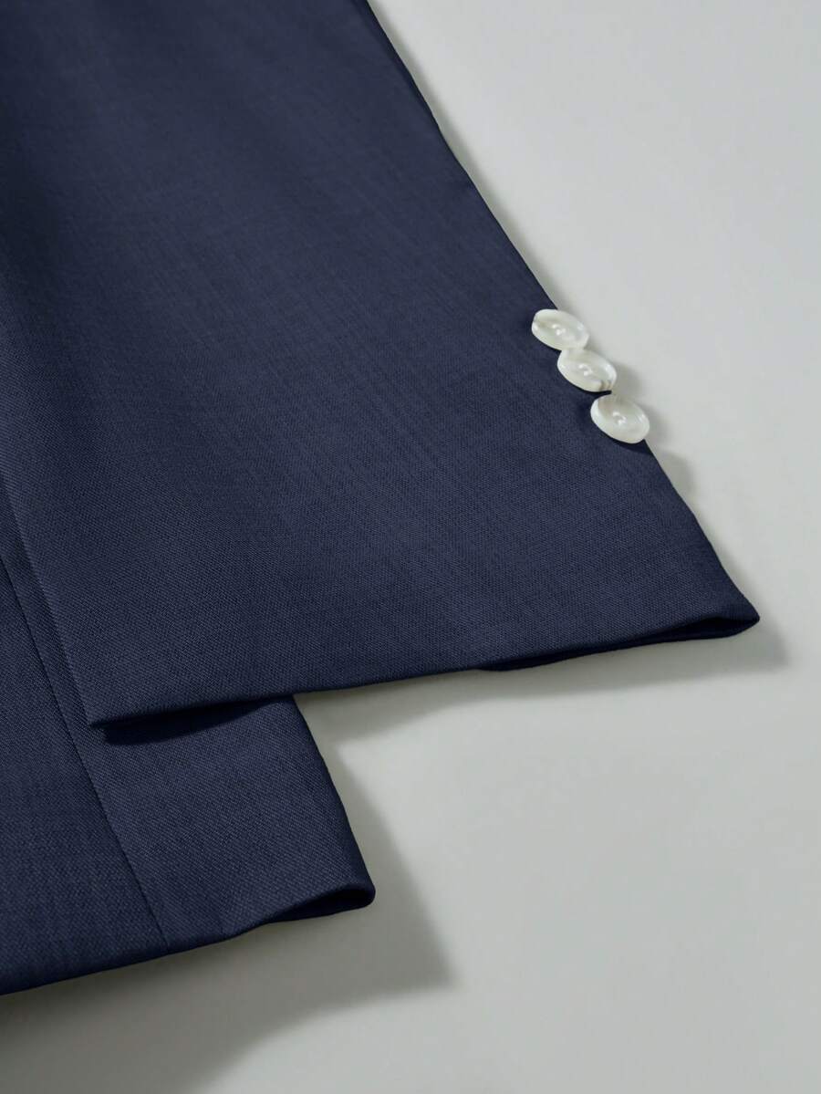 Muški poslovno-ležerni komplet  sa dugim rukavima, sako na kopčanje i ležerne pantalone sa džepovima