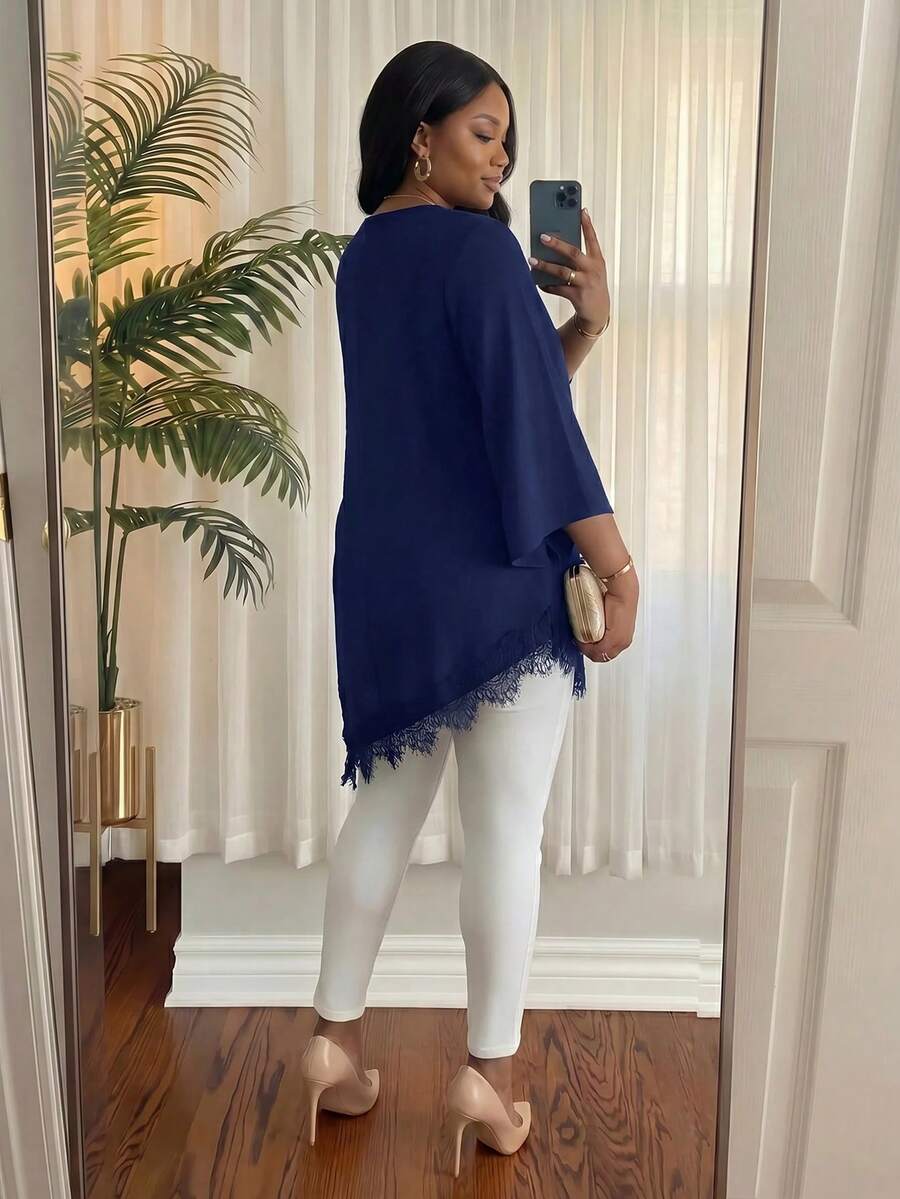 Elegantna bluza za žene plus size sa cvetnim vezom