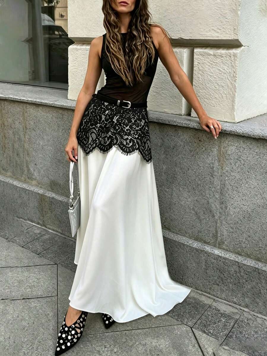 Ženska midi suknja  crno-bela sa čipkastim detaljima
