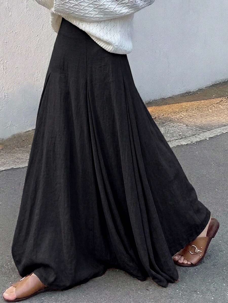 Ženska duga suknja u kišobran kroju, široka, jednobojna, elegantna