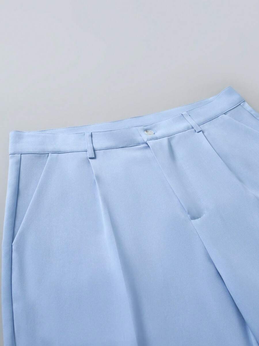 Muški poslovno-ležerni komplet  sa dugim rukavima, sako na kopčanje i ležerne pantalone sa džepovima