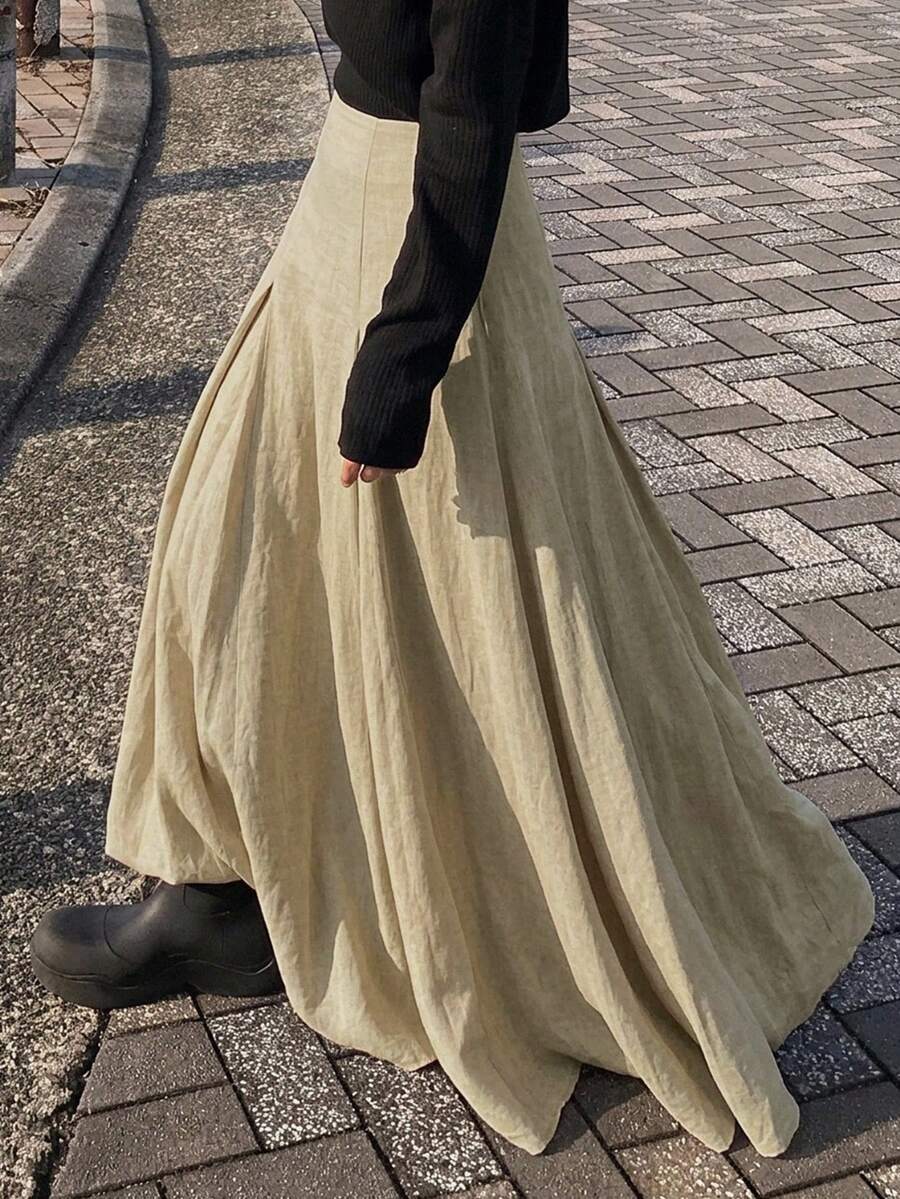 Ženska duga suknja u kišobran kroju, široka, jednobojna, elegantna